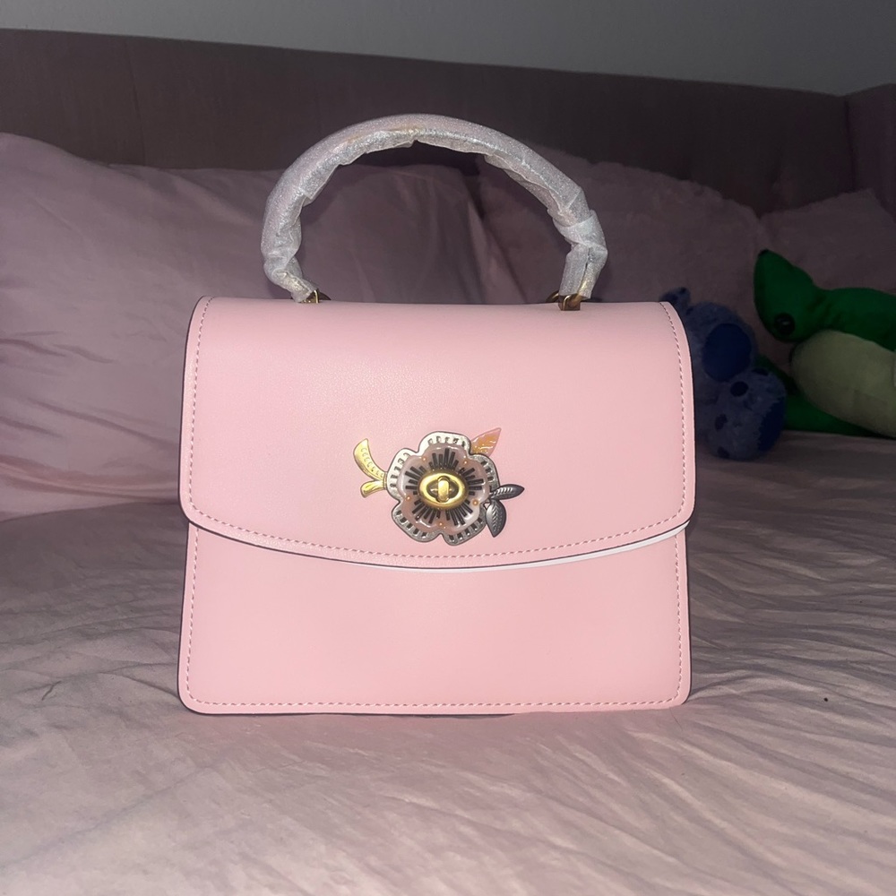 ( SOLD) Coach Parker Tea Rose twistlock bag